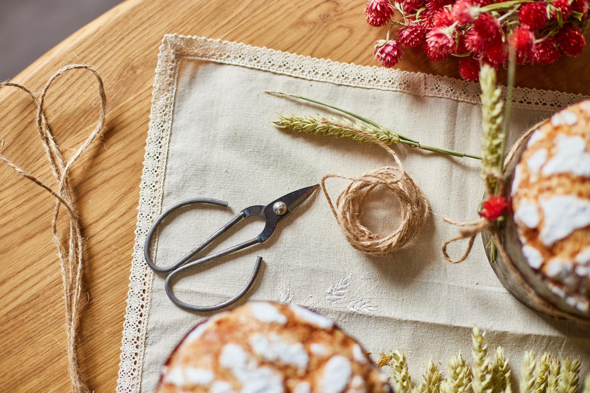 Embroidered linen napkin set on wooden table